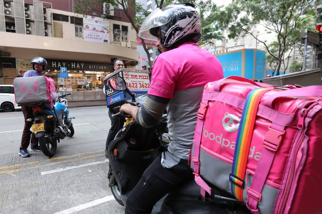Food Panda delivery men in Wan Chai. Photo: Felix Wong