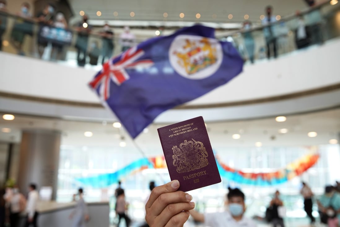 A BN(O) passport is held up during a protest at the IFC shopping centre in Central last year. Photo: Winson Wong