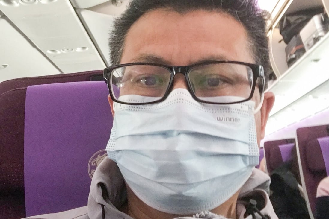 Veteran political activist Guo Feixiong is pictured on a flight from Guangzhou to Shanghai before he attempted to leave China to visit his ill wife in the US. He was stopped by authorities at Shanghai Pudong International Airport, says he would go on a hunger strike before disappearing. Photo: Handout