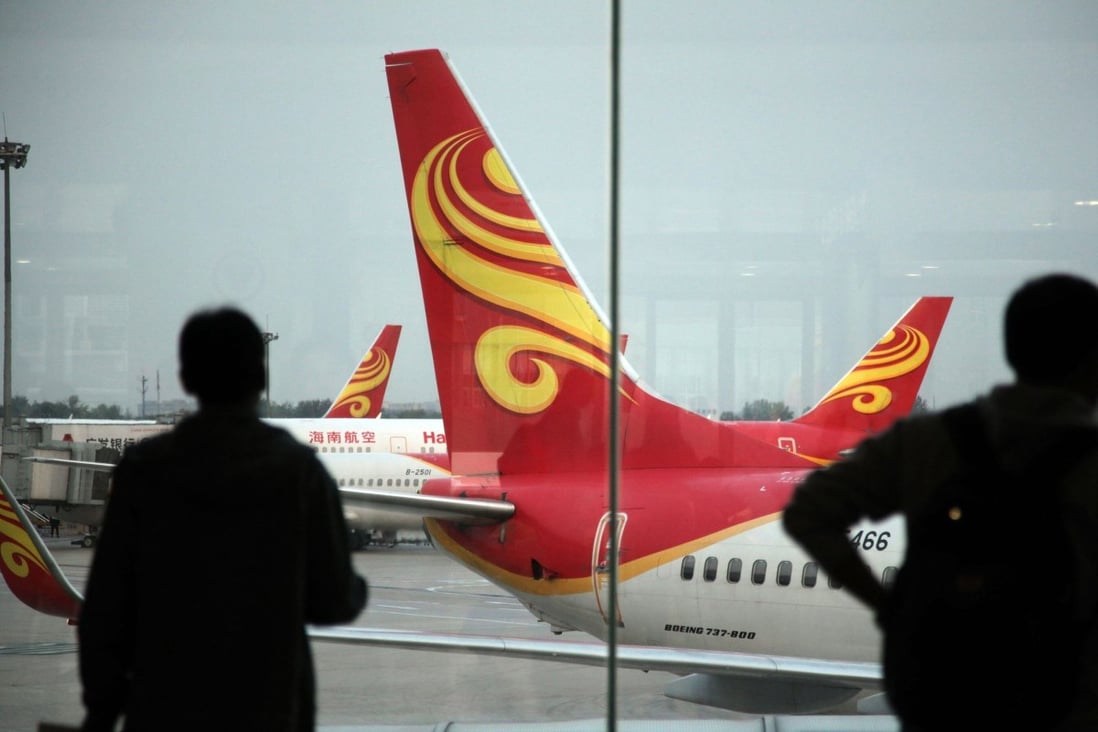 Hainan Airlines said its expects to post massive losses because of problems at parent HNA Group. Photo: AFP
