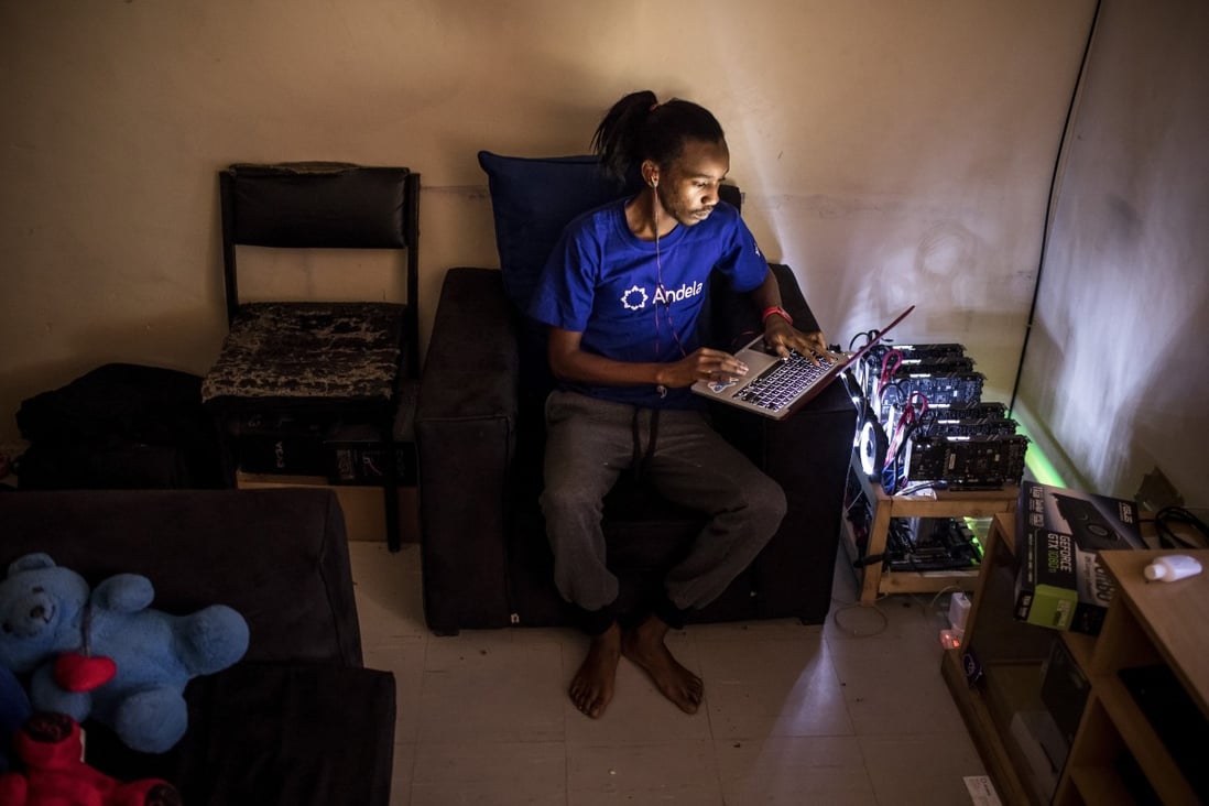Bloomberg Best of the Year 2017: Eugene Mutai, a bitcoin 'miner' and software developer, poses for a photograph with cryptocurrency 'mining' machines at his home in Nairobi, Kenya, on Saturday, Sept. 9, 2017. Photo: Bloomberg