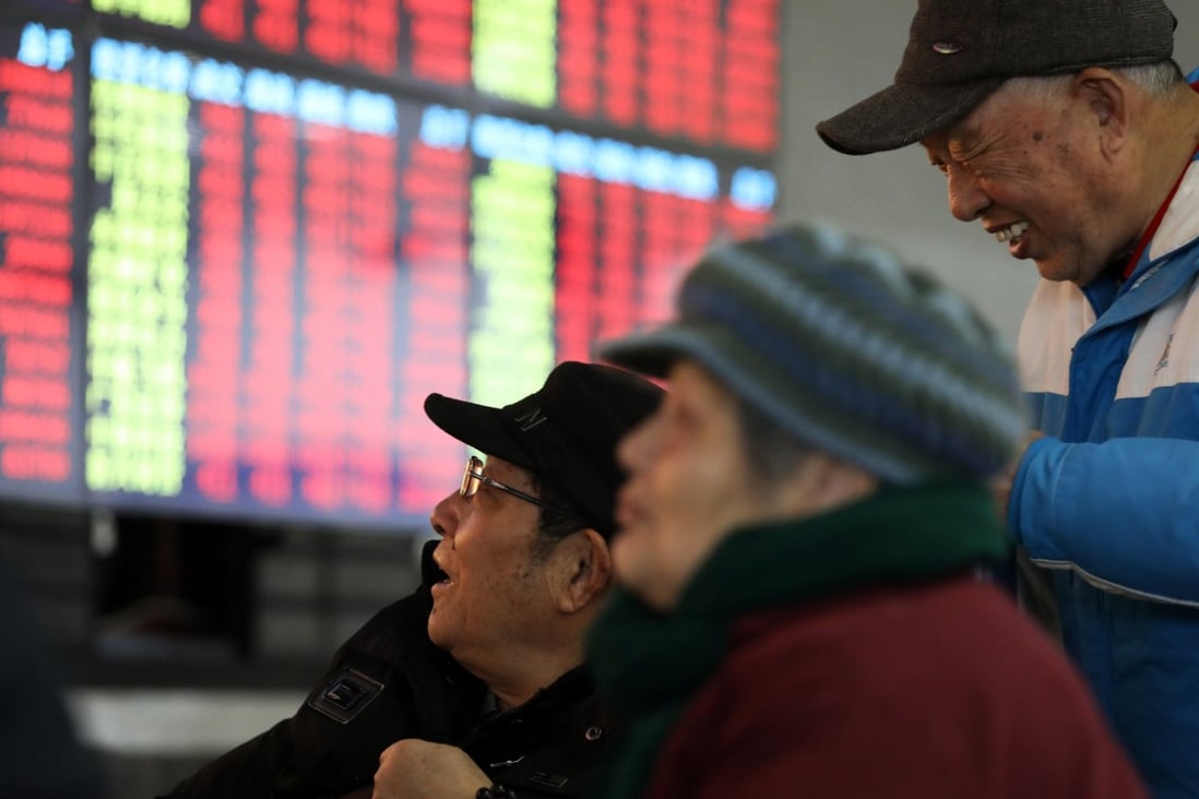 Investors are seen monitoring stock prices in a brokerage gallery in Shanghai in February 2019. The 78 per cent rise in the CSI 300 Index since 2018 leaves the market overstretched, BCA Research says. Photo: Xinhua