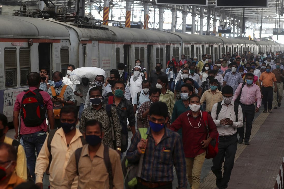 Indian commuters crowd the Chhatrapati Shivaji Terminus in Mumbai, India, on February 1. Photo: AP