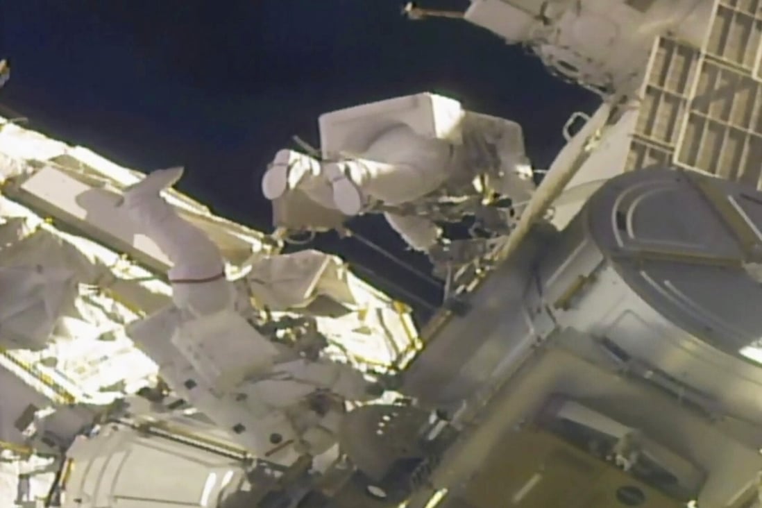 Nasa astronauts work outside the International Space Station on February 1, 2021. Photo: Nasa via AP