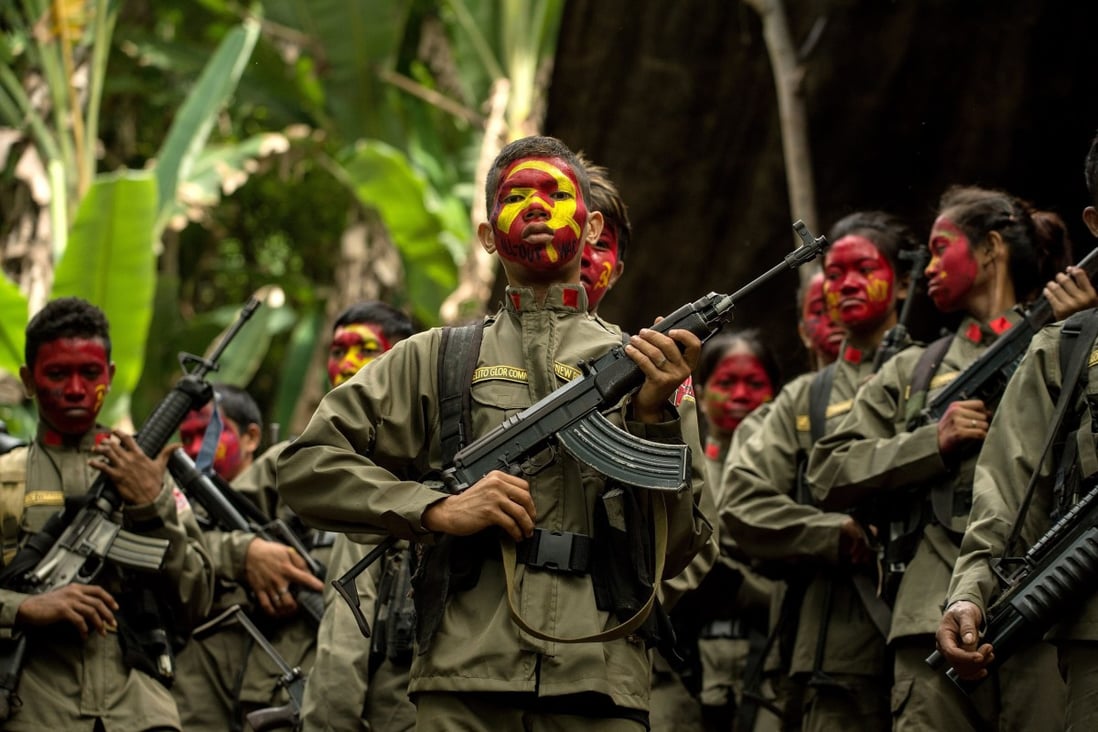 Guerillas of the communist New People's Army pictured in the Philippines in 2017. Photo: AFP
