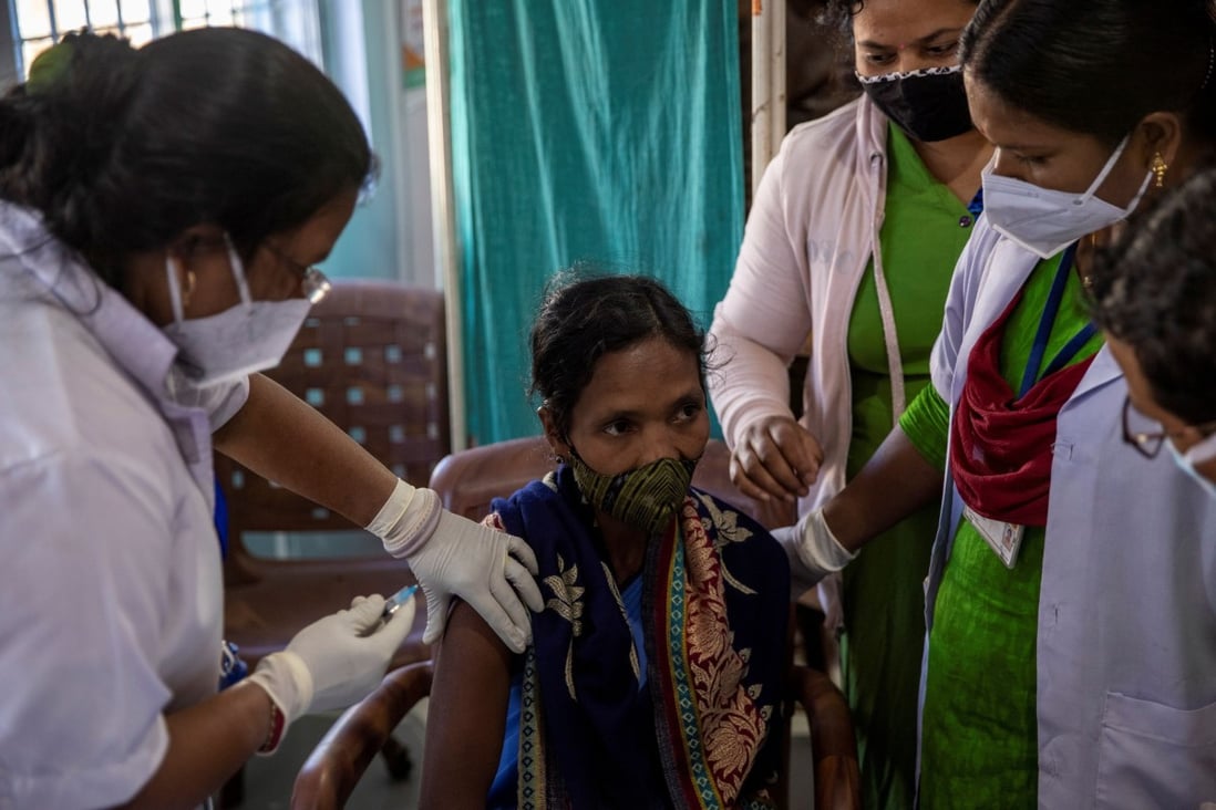 A health worker receives a coronavirus vaccine developed by Oxford/AstraZeneca in India last month. Photo: Reuters