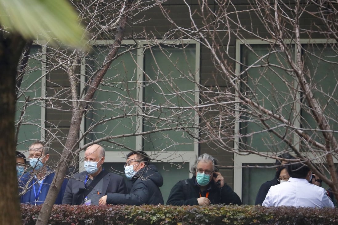 Members of the WHO team investigating the origins of the coronavirus disease visit the Hubei Animal Epidemic Disease Prevention and Control Centre in Wuhan, Hubei province, China on Tuesday, February 2. Photo: Reuters