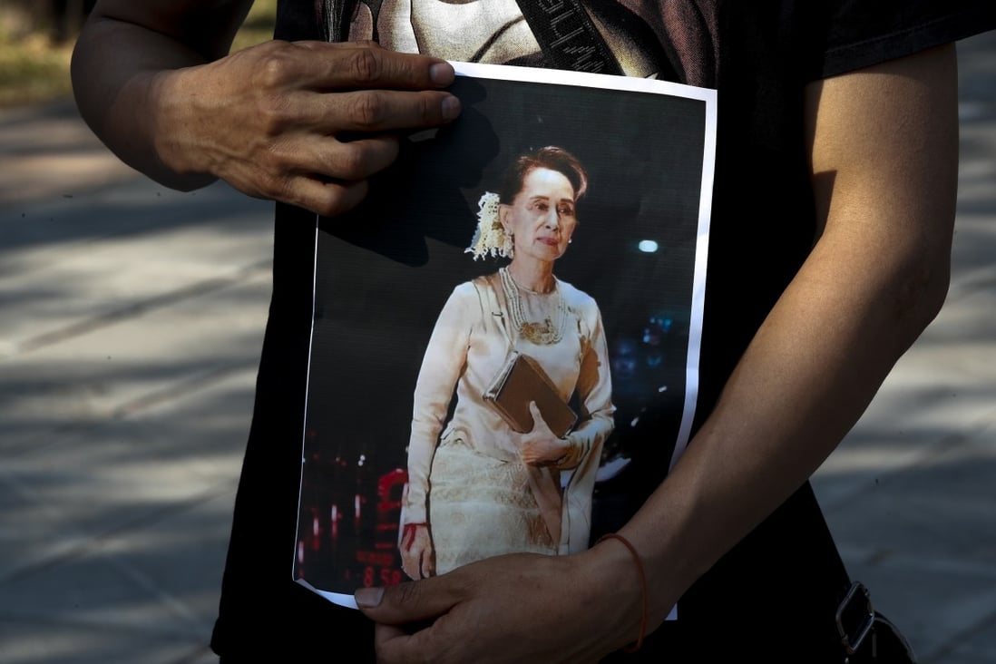 A supporter holds a photo of Myanmar leader Aung San Suu Kyi during a protest against the military coup on Tuesday. Photo: EPA-EFE