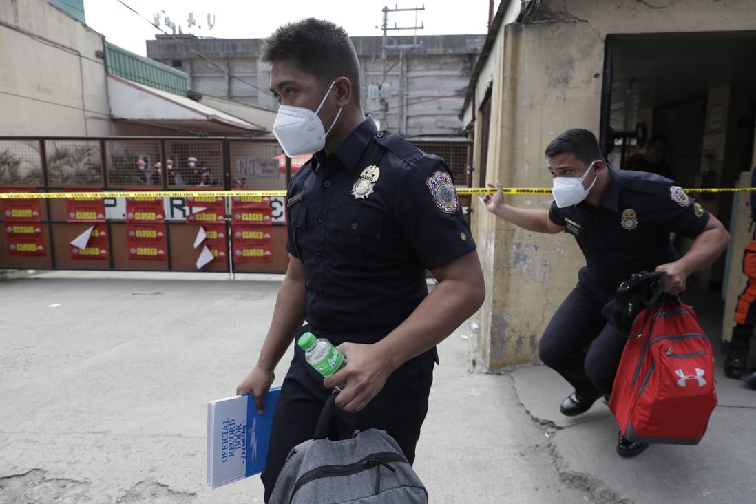 Investigators work at the TP Marcelo Ice Plant on February 4, 2021, in Navotas, Philippines. Photo: AP