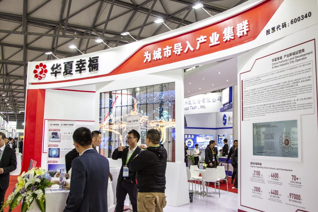 The stand of China Fortune Land Development at an expo in Shanghai in March 2019. Photo: AFP