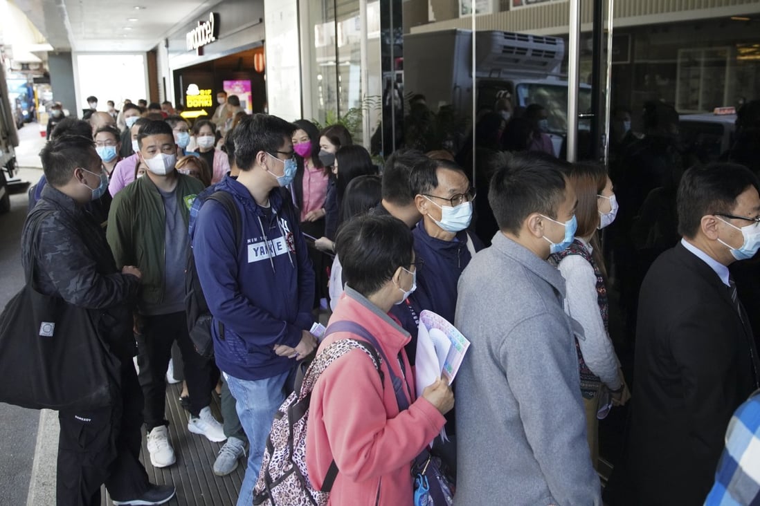 Buyers lining up for Skypoint Royale at the developer’s sales office at The Mira Hotel in Tsim Sha Tsui on February 6, 2021. Photo: Winson Wong
