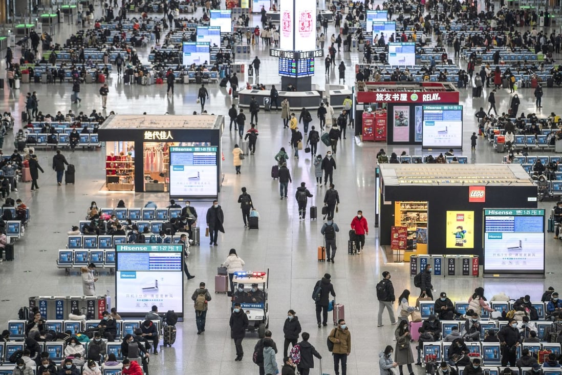 Travelers at the departure hall of the Hongqiao Railway Station in Shanghai ahead at the start of this year’s Lunar New Year travel rush. Photo: Bloomberg