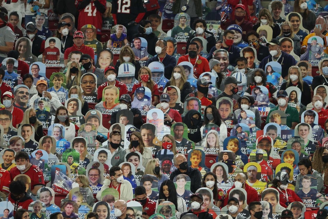 Fans sit among cardboard cut-outs at Super Bowl LV between the Tampa Bay Buccaneers and the Kansas City Chiefs at Raymond James Stadium in Tampa, Florida. Photo: AFP