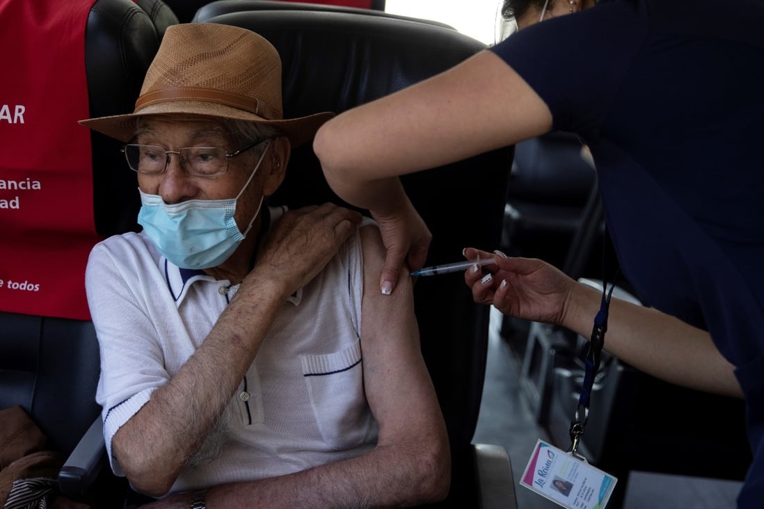 A nurse vaccinates a patient against Covid-19 at a mobile vaccination post in Santiago, Chile on Monday. In addition to the Sinovac shot, Chile has approved those from Pfizer and AstraZeneca. Photo: EPA-EFE