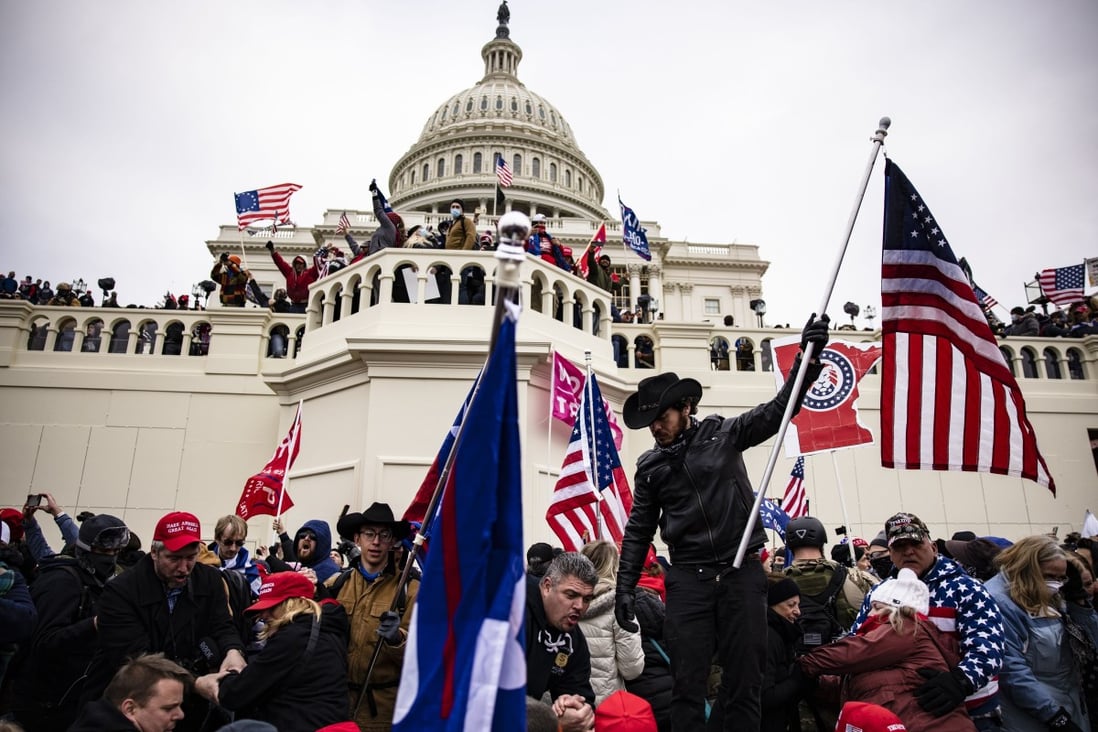 Pro-Trump supporters storm the US Capitol in Washington in January. Photo: AFP