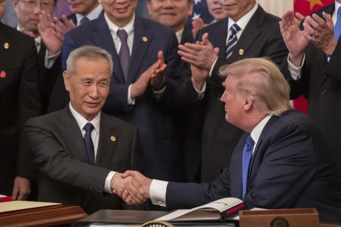 Former US president Donald Trump and China’s Vice-Premier Liu signed the phase one trade deal in January 2020. Photo: EPA-EFE