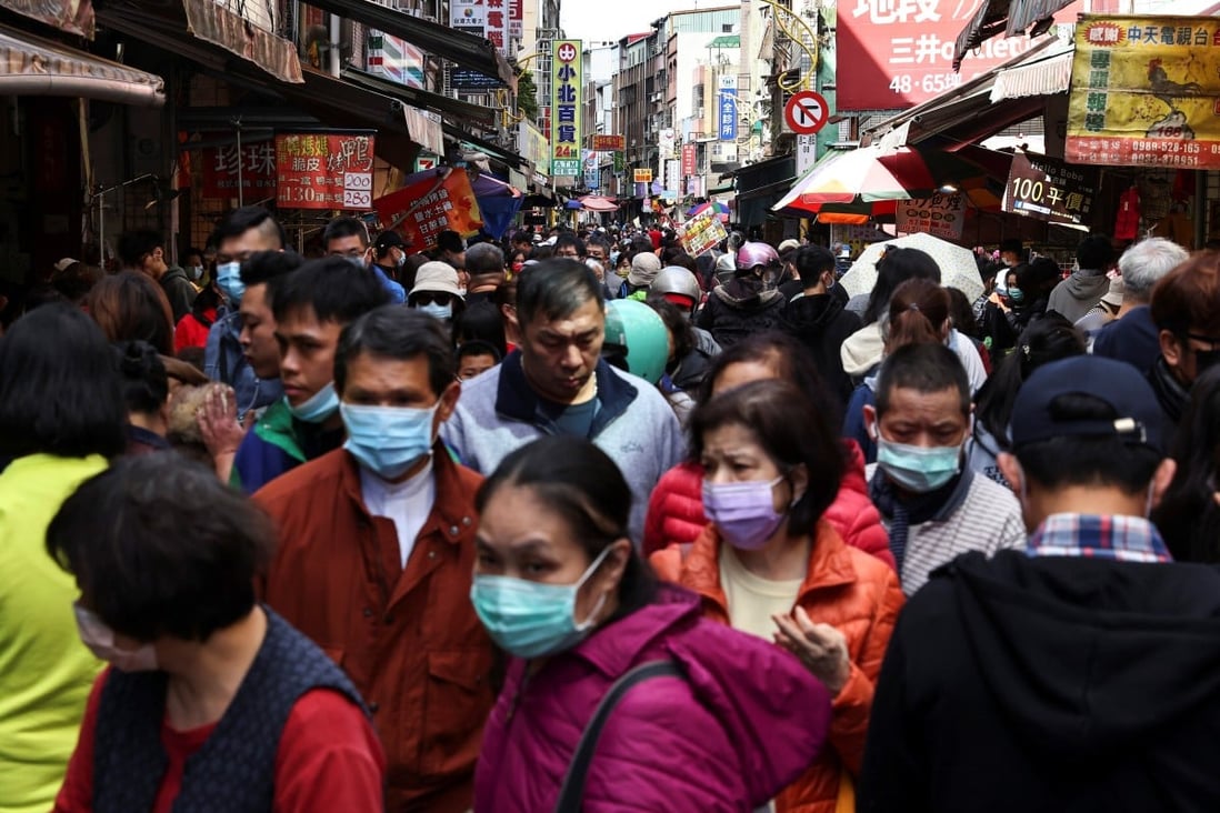 Crowds gather during the Lunar New Year holiday in Taiwan, where the coronavirus has been largely contained. Photo: Reuters