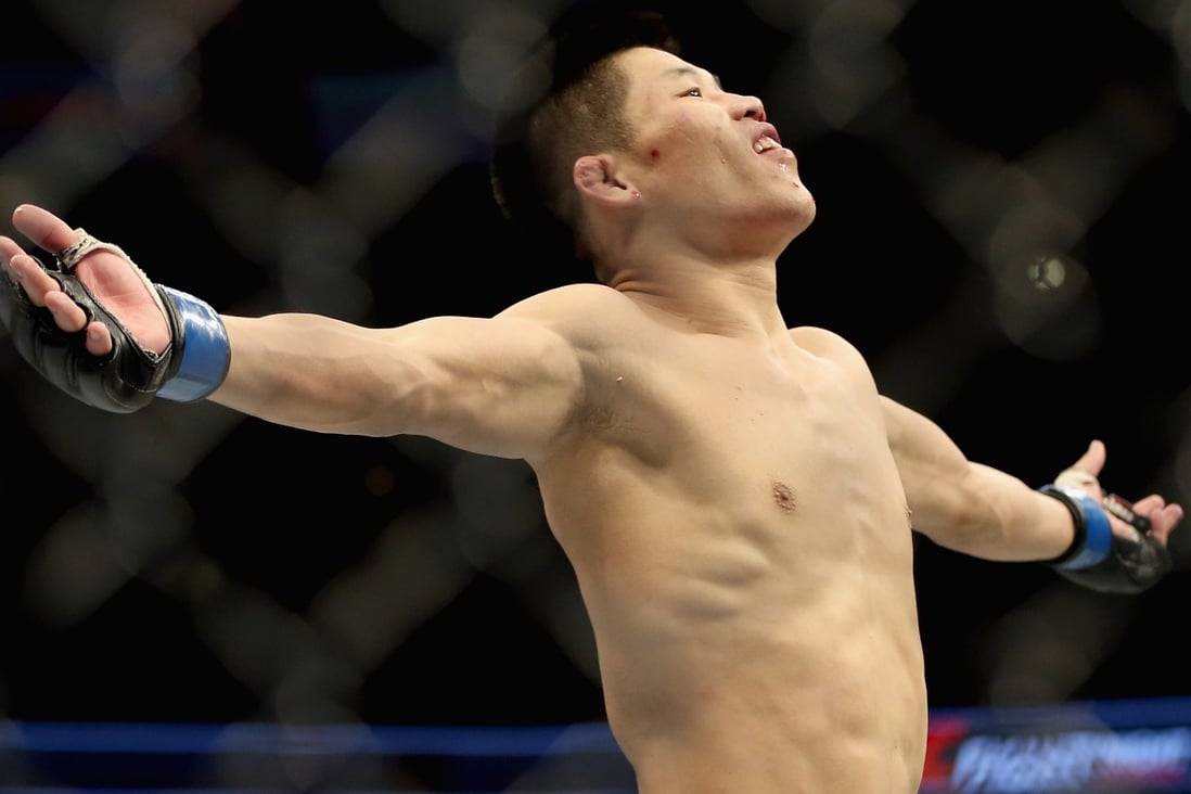 China’s Li Jingliang celebrates his win over Bobby Nash in the welterweight division at UFC Fight Night in 2017 in Denver, Colorado. Photo: Getty Images