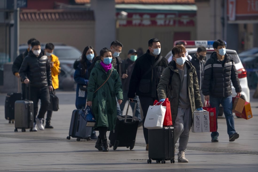 Millions of Chinese face mandatory coronavirus tests to travel during the Lunar New Year holiday. Photo: AP