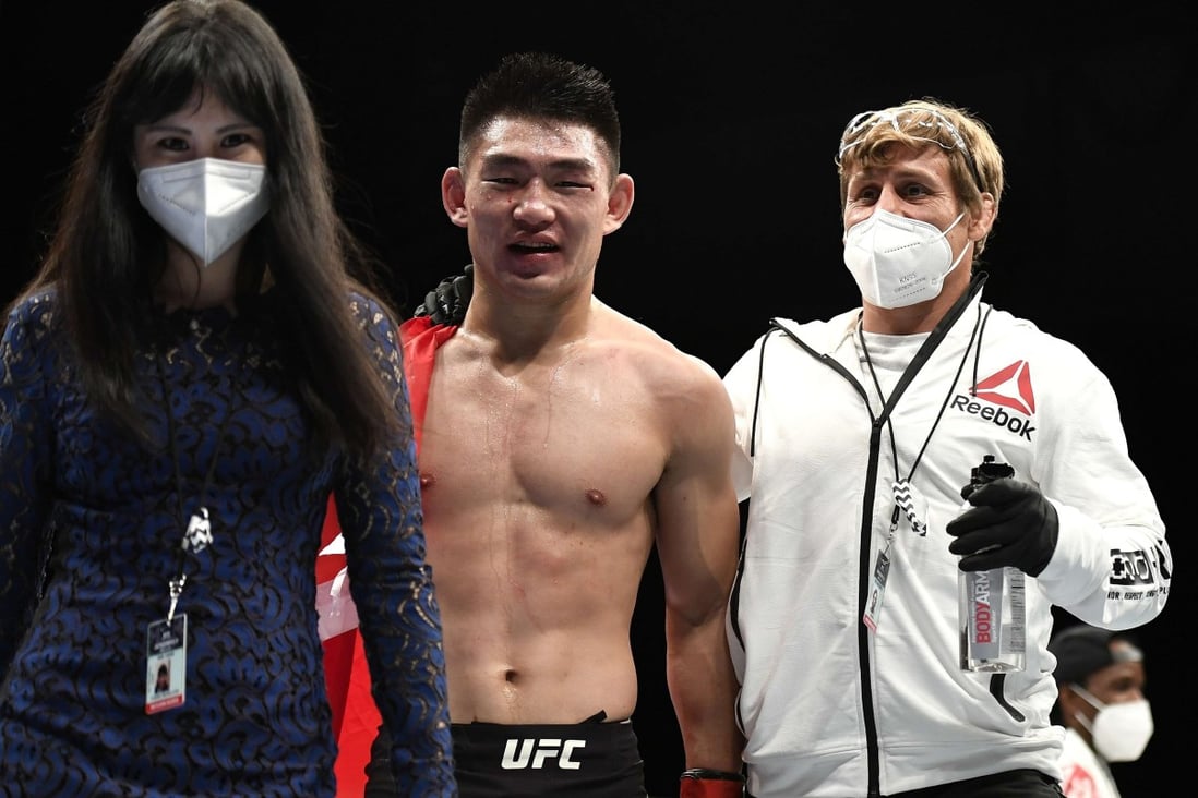 Song Yadong of China celebrates after defeating Marlon Vera in their UFC Fight Night bout in May 2020. Photo: AFP
