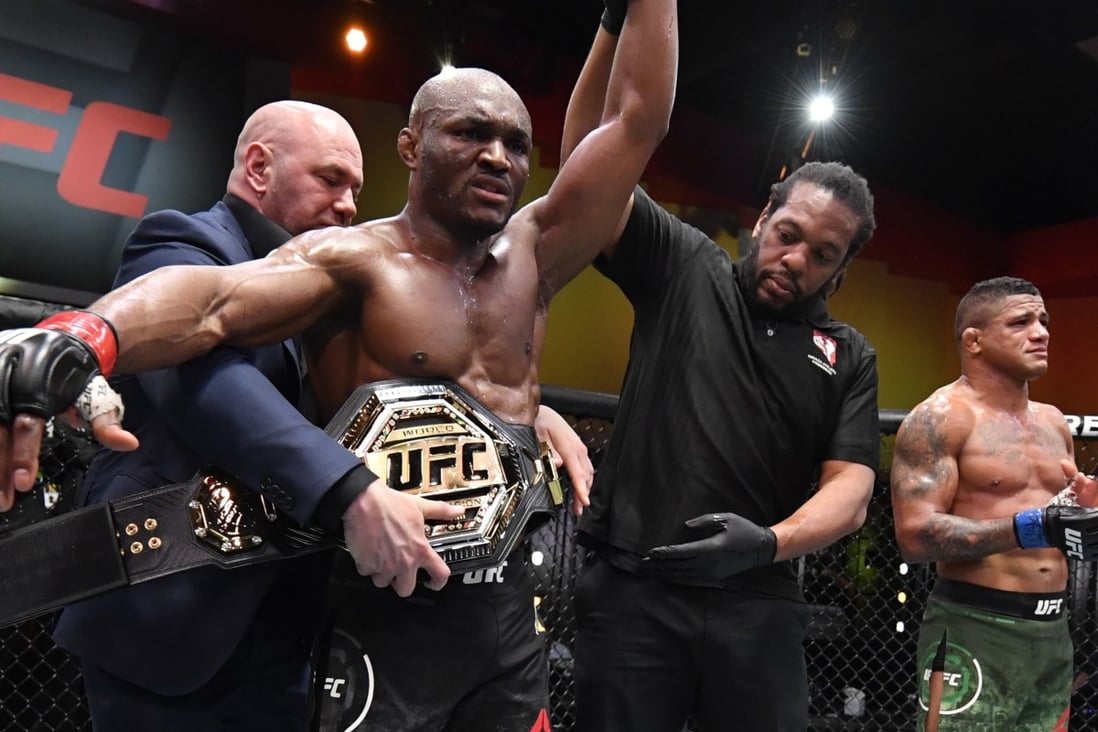 Kamaru Usman celebrates after his victory over Gilbert Burns in their UFC welterweight championship fight at UFC 258 in Las Vegas, Nevada. Photos: Jeff Bottari/Zuffa LLC