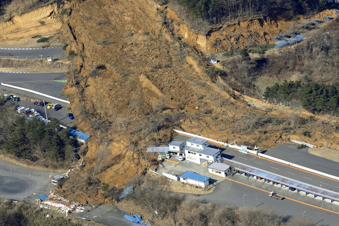 A landslide caused by a strong earthquake covers a circuit course in Nihonmatsu city, Fukushima prefecture, northeastern Japan. Photo: AP