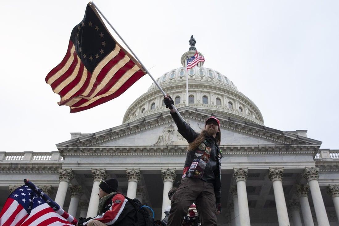 Trump supporters storm the grounds of the US Capitol in Washington in January. Photo: EPA-EFE