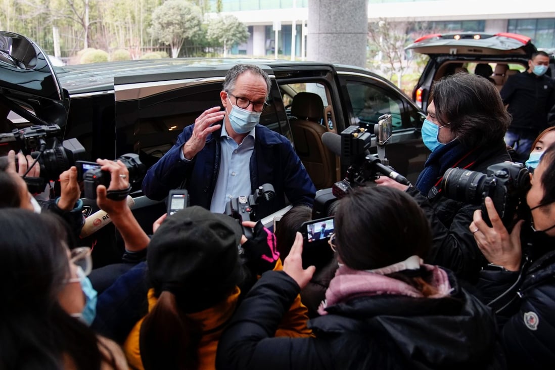 WHO team leader Peter Ben Embarek arrives at the airport in Wuhan on February 10 after the scientists spent weeks on the ground there. Photo: Reuters
