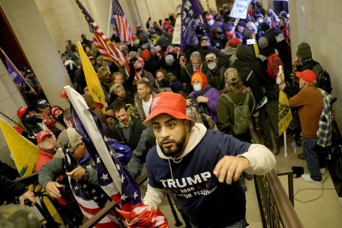 A pro-Trump mob enters the US Capitol building in Washington on January 6, in an attack organised on online platforms. Photo: Getty Images / TNS