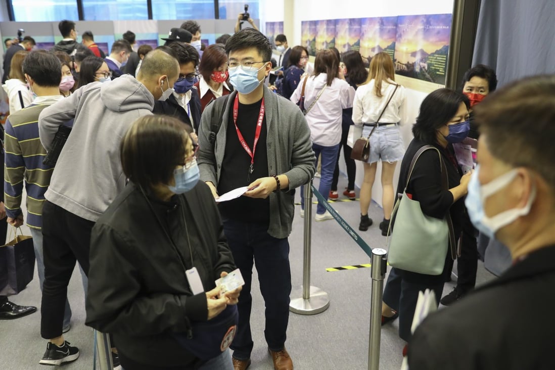 Buyers line up for Skypoint Royale developed by Hong Kong Ferry (Holdings) in the sales office at Mira Place One, Tsim Sha Tsui on February 20, 2021. Photo: Dickson Lee