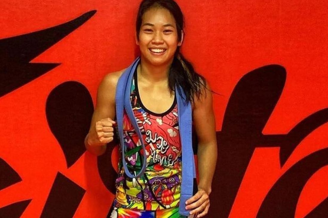 ONE Championship Muay Thai fighter Wondergirl Fairtex shows off her new blue belt. Photo: Instagram