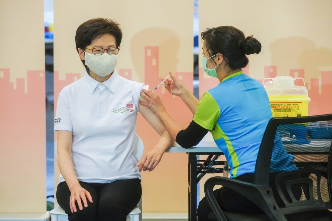 Carrie Lam receives the Sinovac jab at the community vaccination centre in Hong Kong’s Central Library. Photo: Sam Tsang