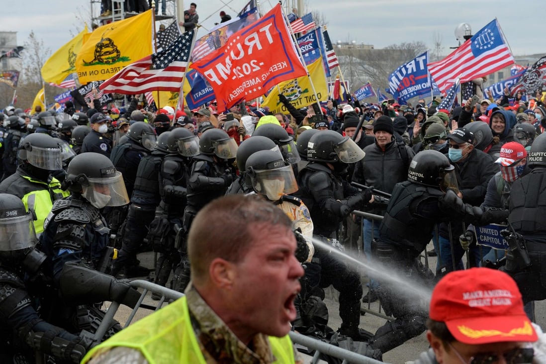 Trump supporters clash with police and security forces at the storming of the US Capitol on January 6. Photo: AFP