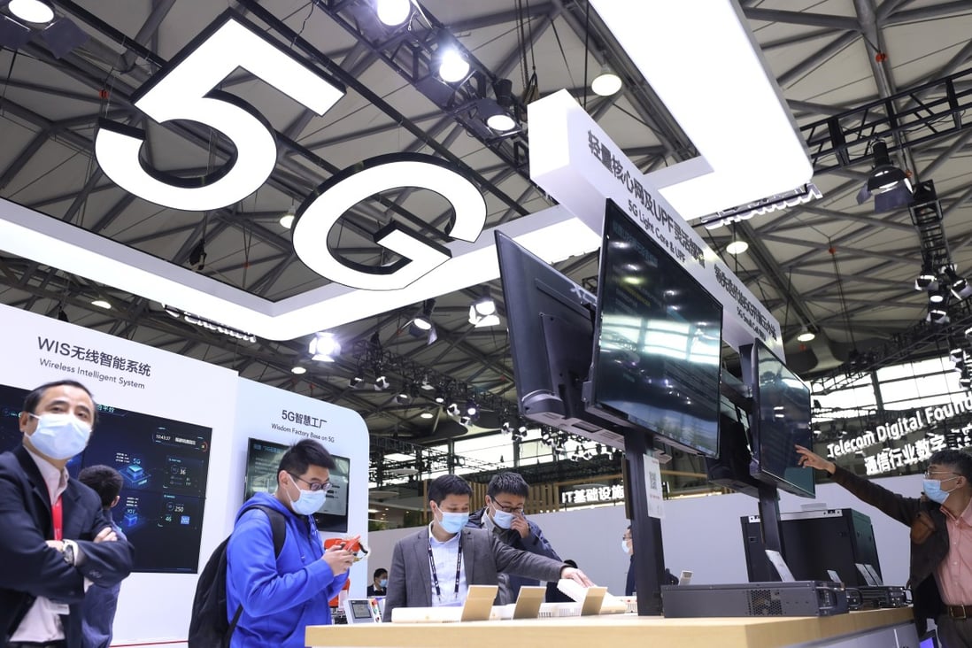 A large 5G signage is seen above an exhibition booth at telecommunications industry trade show MWC Shanghai on February 23, 2021. Photo: Xinhua
