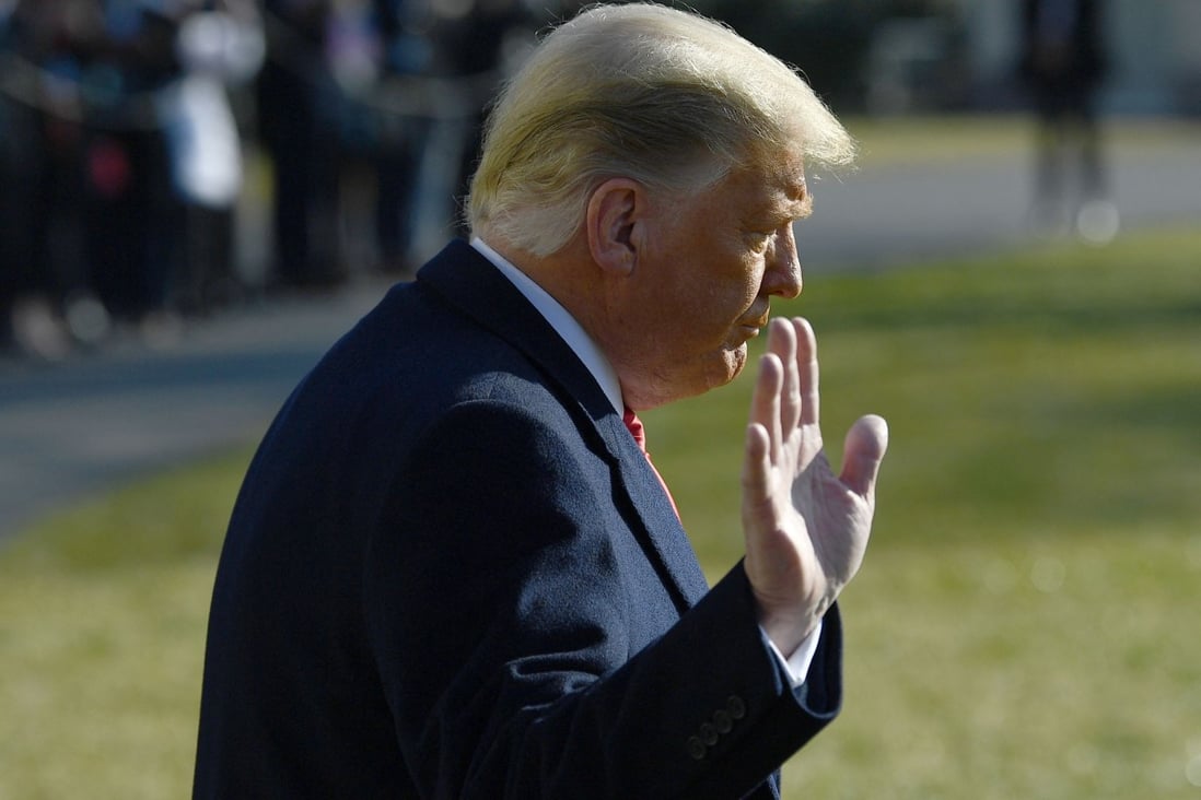 US President Donald Trump waves to the media outside the White House in Washington in January. Photo: AFP
