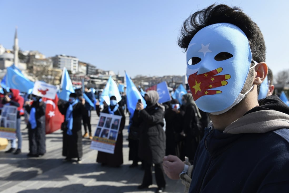 A member of the Uygur community living in Turkey joins an anti-China protest in Istanbul on Friday. Photo: AP