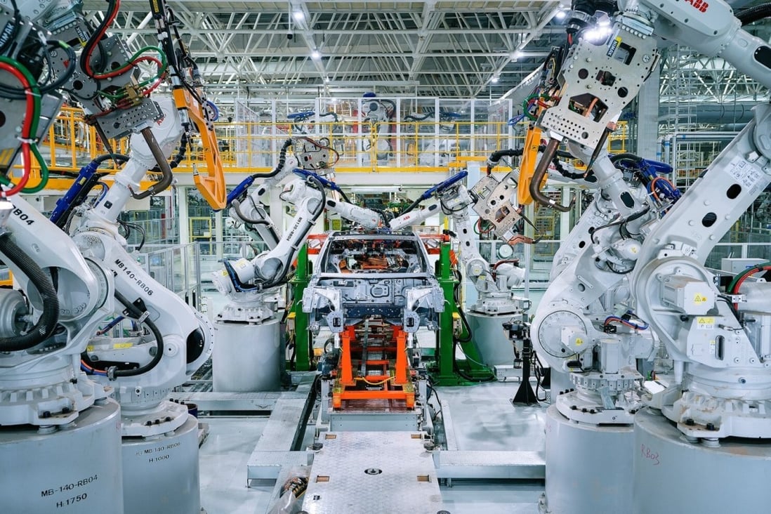Xpeng’s new factory in the Guangdong provincial city of Zhaoqing touts 100 per cent automation for installation of car bodies at its welding workshops, with over 200 robotic arms. Photo: SCMP