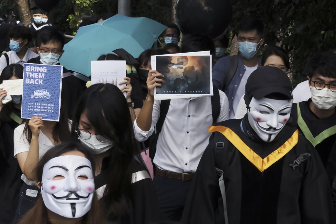 Graduates of Chinese University march in November calling for 12 Hongkongers detained on the mainland to be returned. Photo: K. Y. Cheng