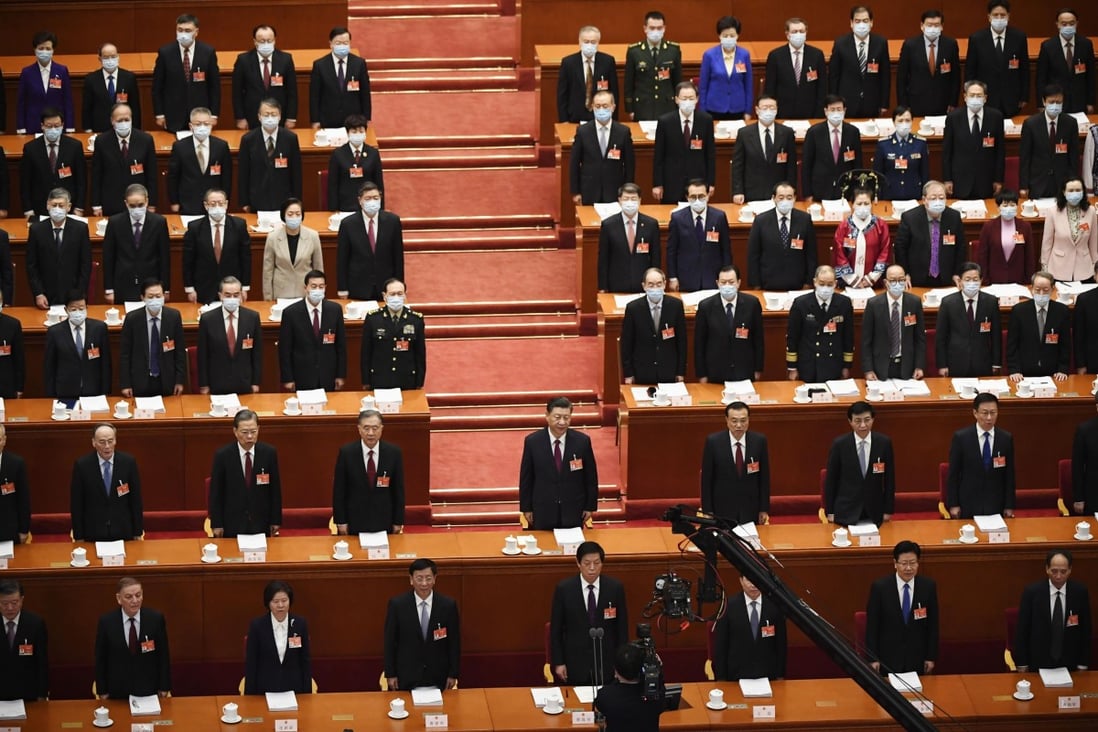 Participants sing the Chinese national anthem at the opening ceremony of the National People's Congress at the Great Hall of the People in Beijing on March 5, 2021. President Xi Jinping is in the centre. Photo: Kyodo