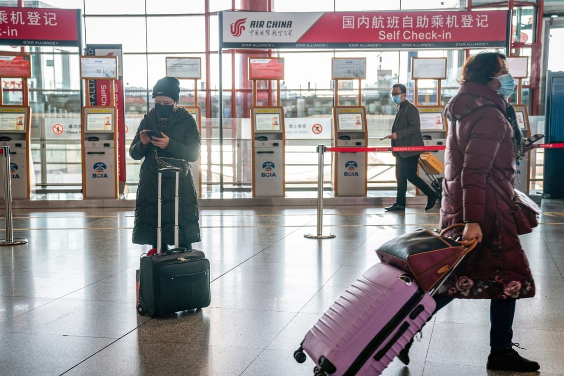 China is unlikely to relax its travel restrictions as it seeks to prevent importing new coronavirus cases. Photo: Bloomberg