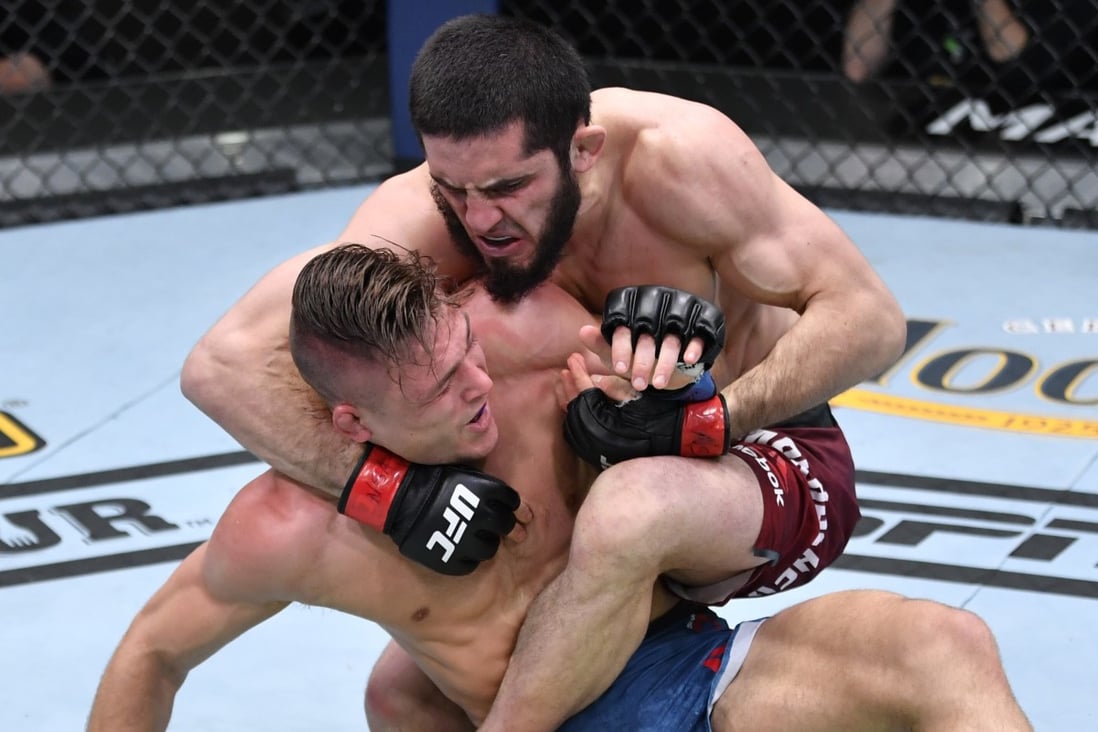Islam Makhachev works for a submission against Drew Dober in their lightweight fight during UFC 259. Photo: Jeff Bottari/Zuffa LLC