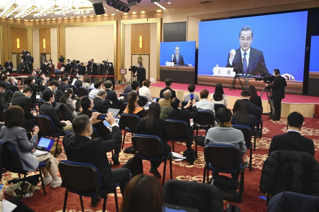 Foreign Minister Wang Yi holds a press conference on the sidelines of the National People’s Congress on Sunday. Photo: Kyodo