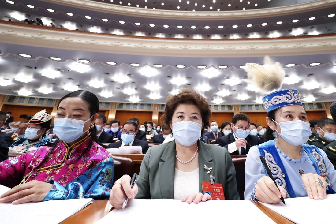 Deputies at an NPC session on Monday. Photo: Xinhua