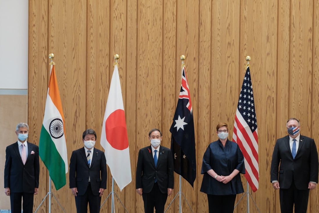 Japan’s Prime Minister Yoshihide Suga (centre) and the foreign ministers of India, Japan, Australia and the United States met in Tokyo in October. Now, the leaders of those nations are meeting virtually, drawing criticism from China about the purpose and significance of the Quadrilateral Security Dialogue. Photo: AFP