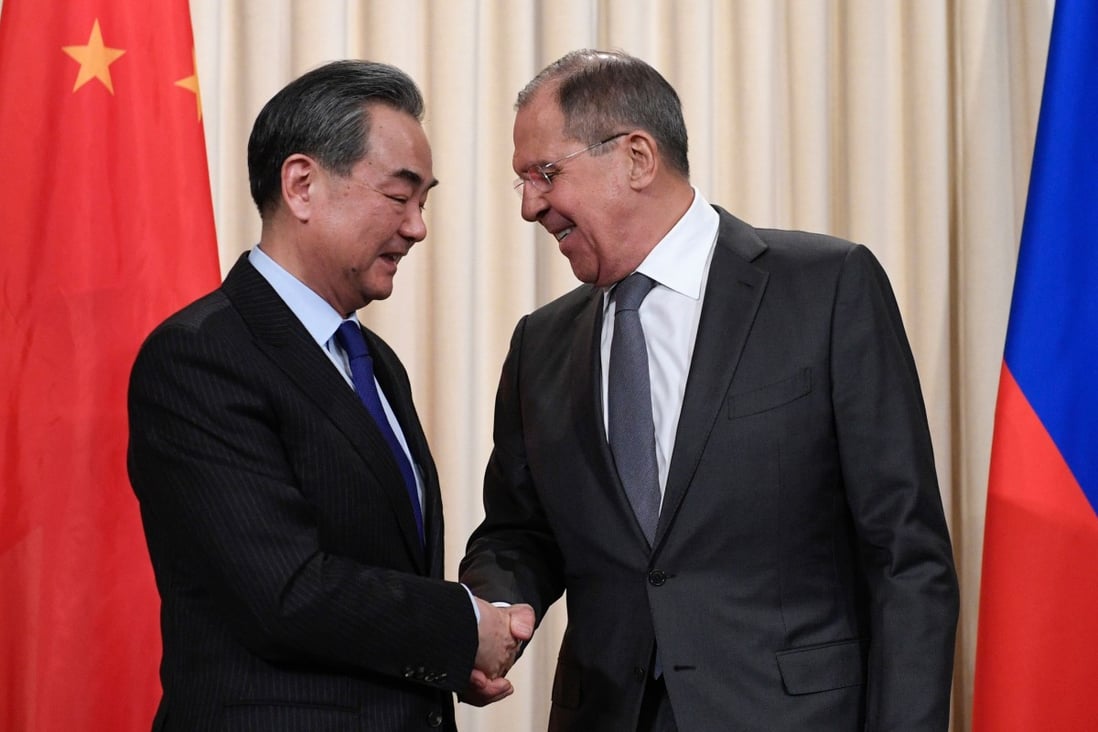 Wang Yi and Sergei Lavrov (pictured together in 2018) are set to meet in Beijing on Monday. Photo: AFP
