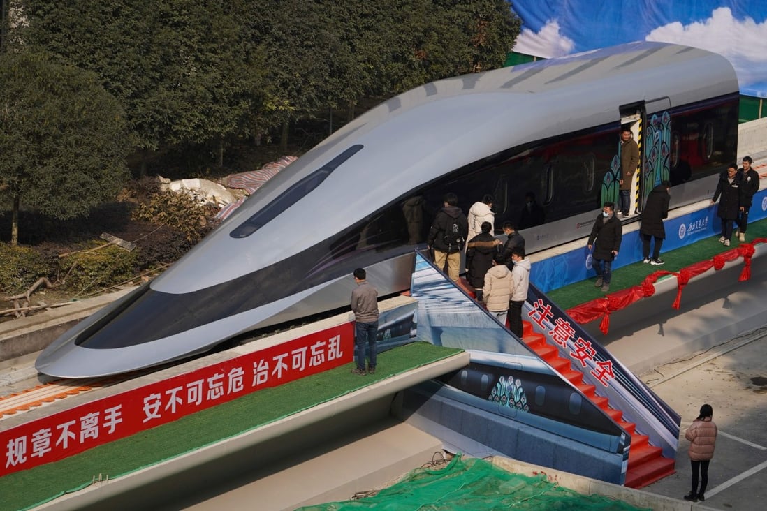 People visit a prototype of China’s new superfast maglev train in Chengdu in January. Photo: AFP