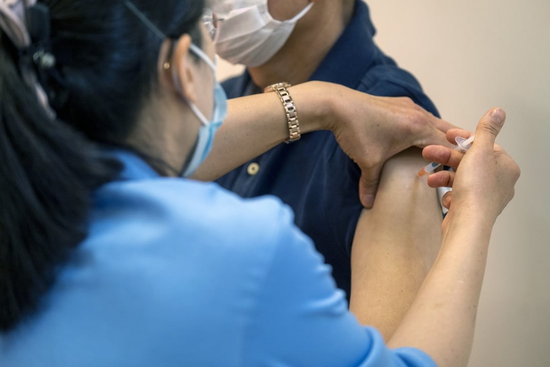 A nurse administers a dose of the Sinovac Covid-19 vaccine at a community centre in Hong Kong. Photo: Bloomberg