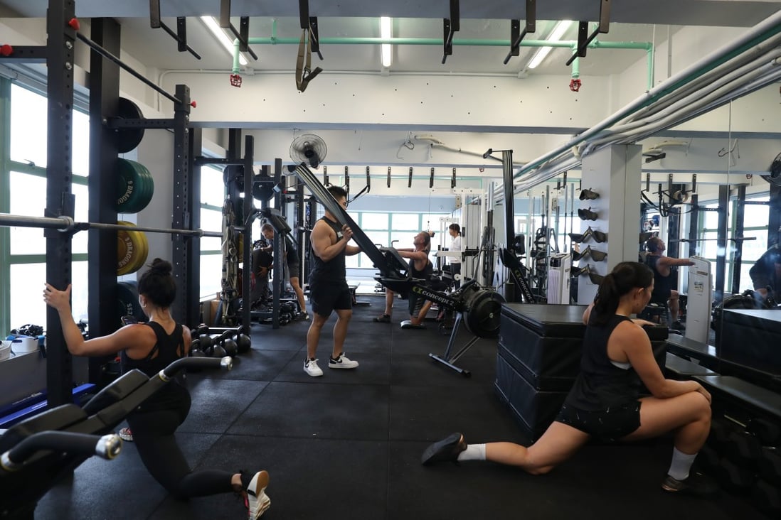 Gym goers work out at a gym in Central on September 18, 2020. Given that major outbreaks in Hong Kong have been linked to bars with live bands, dance halls, restaurants and gyms, ventilation in buildings needs to more rigorously monitored. Photo: Xiaomei Chen