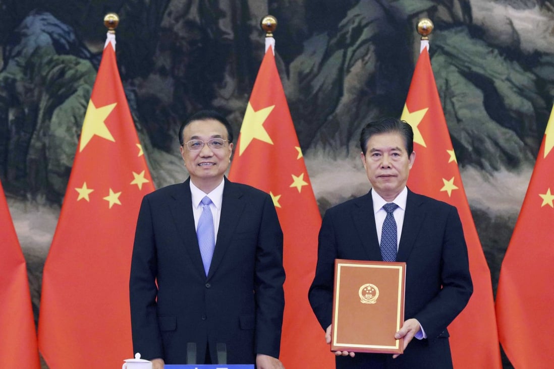 Chinese Premier Li Keqiang, left, and Commerce Minister Zhong Shan at the signing ceremony of the Regional Comprehensive Economic Partnership (RCEP) agreement in Beijing last year. Photo: Xinhua