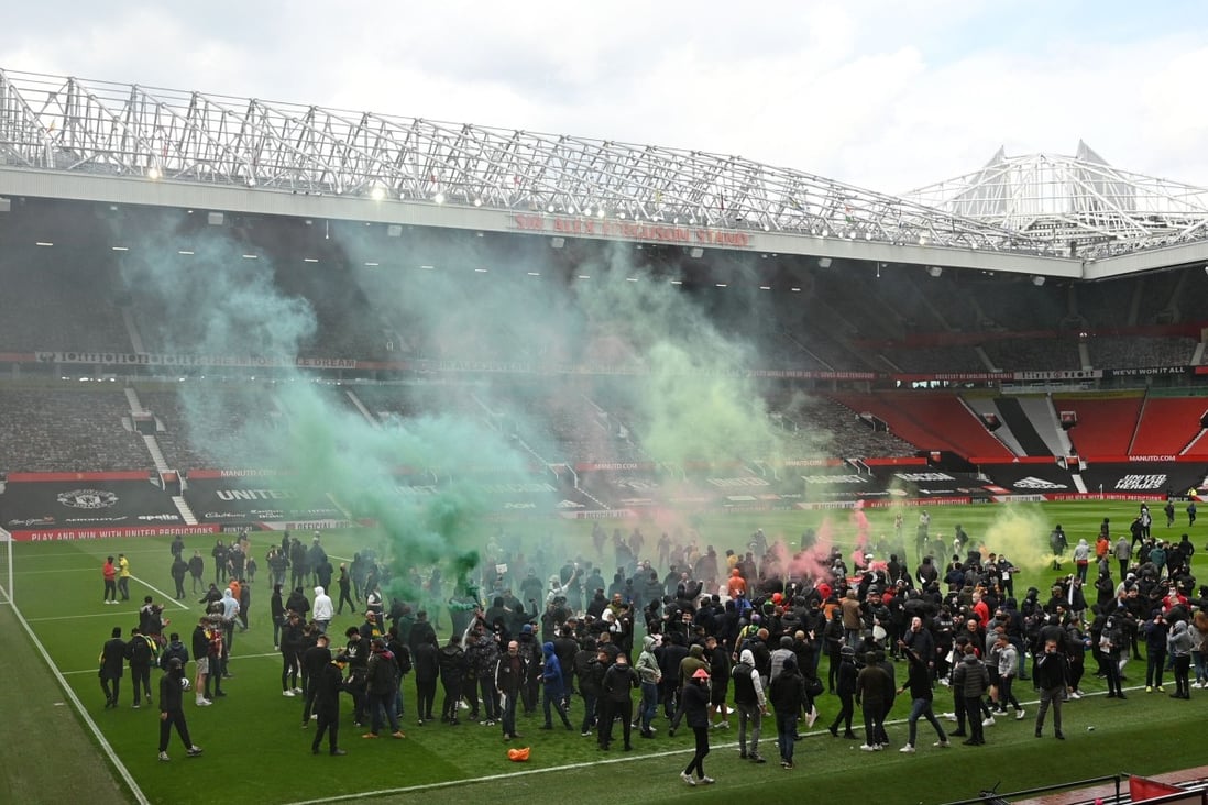 Supporters protest against Manchester United’s owners, the Glazer family, inside Old Trafford stadium in Manchester, UK on Sunday. Photo: AFP